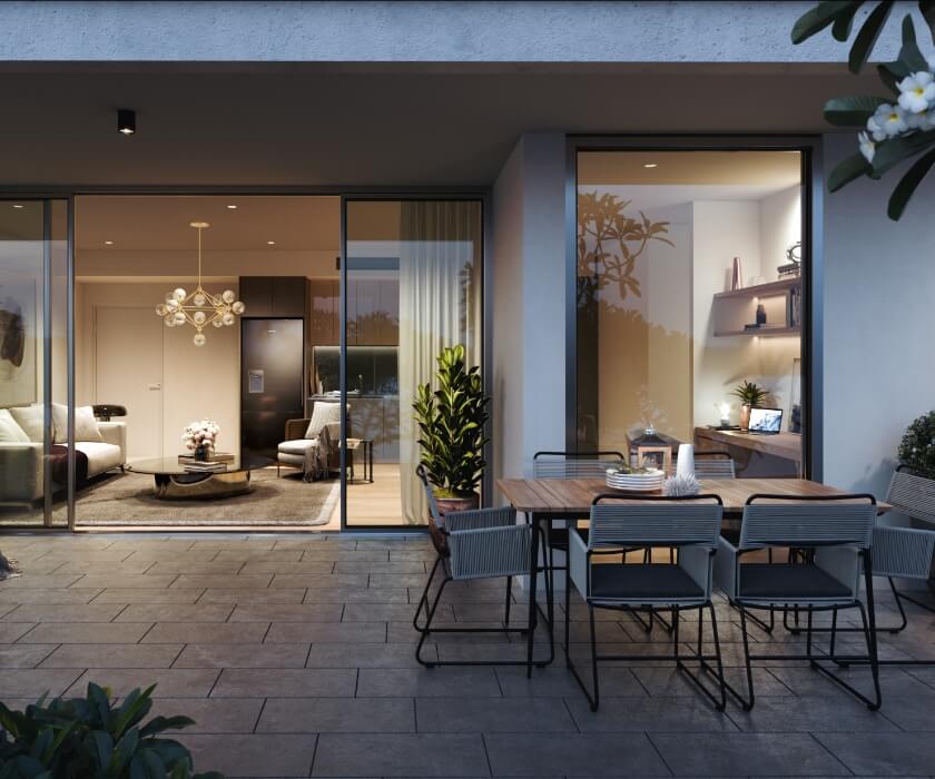 Image of an outdoor dining area looking into the living room of a modern living room